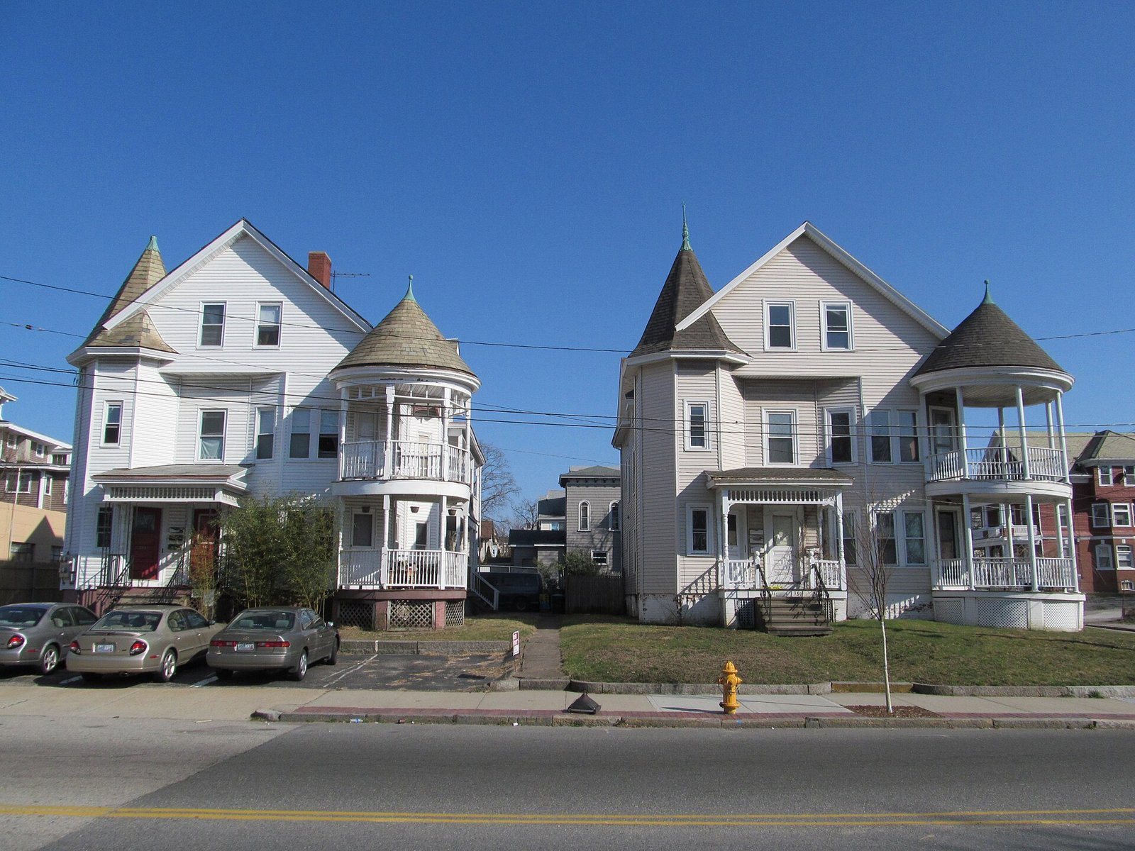 Victorian multi-family houses on a street in Pawtucket, Rhode Island